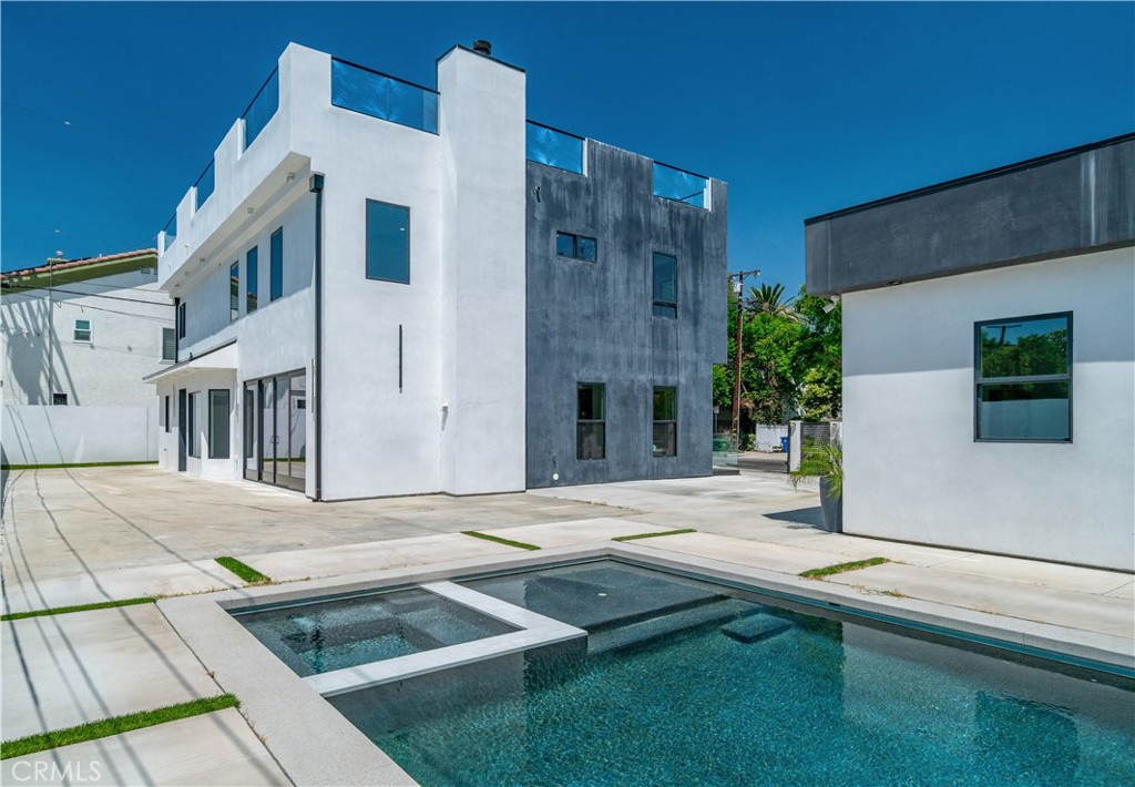 13838 Milbank Street Sherman Oaks, CA 91423 - Photo 49 of 57 a view of building with yard