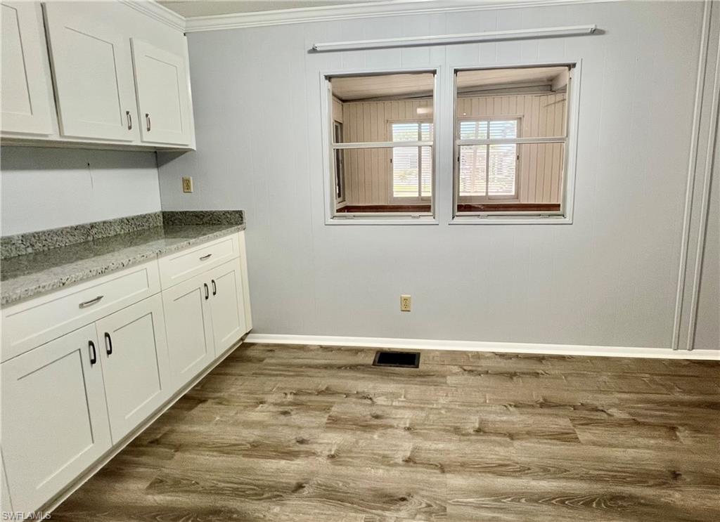 13 Cannes Drive Naples, FL 34112 - Photo 11 of 50 a view of empty room with window