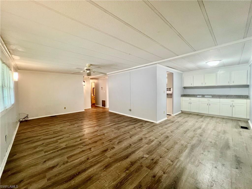 13 Cannes Drive Naples, FL 34112 - Photo 14 of 50 a view of a room with an empty space