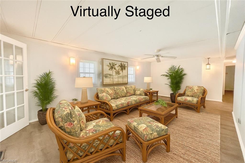 13 Cannes Drive Naples, FL 34112 - Photo 17 of 50 a living room with furniture