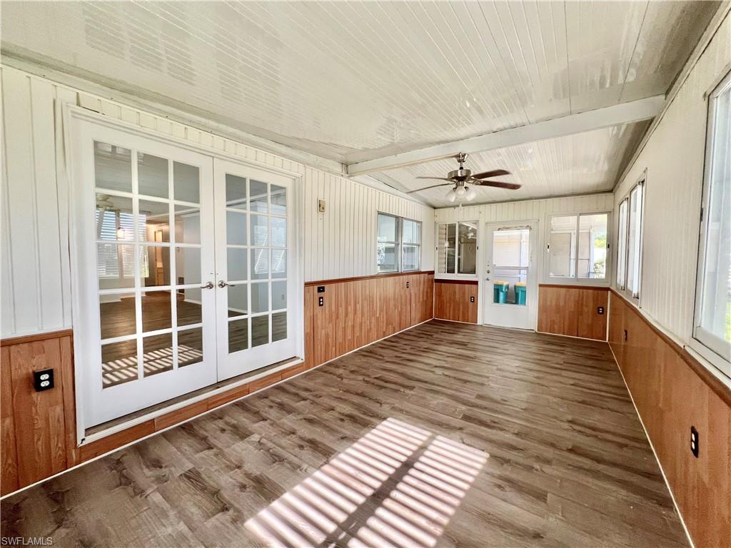 13 Cannes Drive Naples, FL 34112 - Photo 24 of 50 a view of a living room with windows