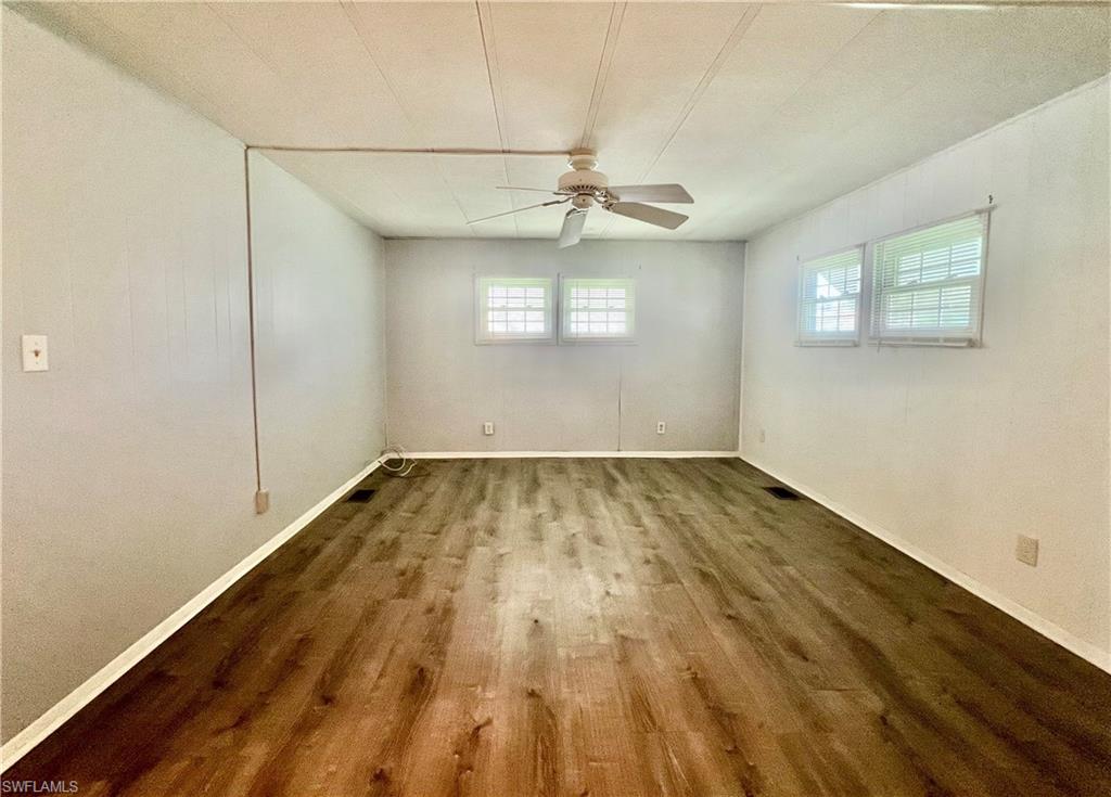 13 Cannes Drive Naples, FL 34112 - Photo 35 of 50 an empty room with a window