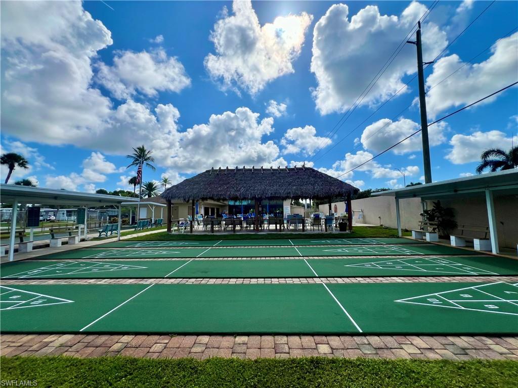 13 Cannes Drive Naples, FL 34112 - Photo 46 of 50 a view of a volley ball court
