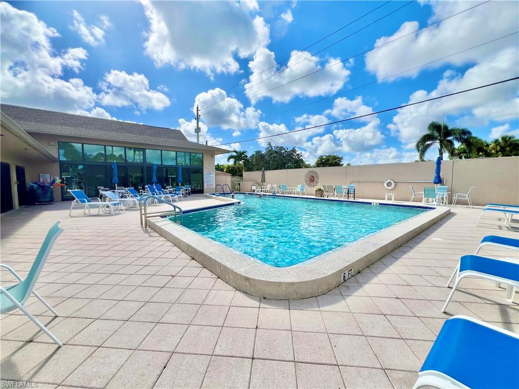 13 Cannes Drive Naples, FL 34112 - Photo 48 of 50 a view of a backyard