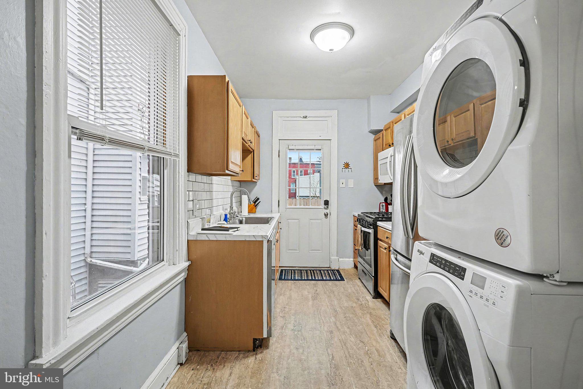 353 East Marion Street Lancaster, PA 17602 - Photo 14 of 28 a view of a kitchen with washer and dryer