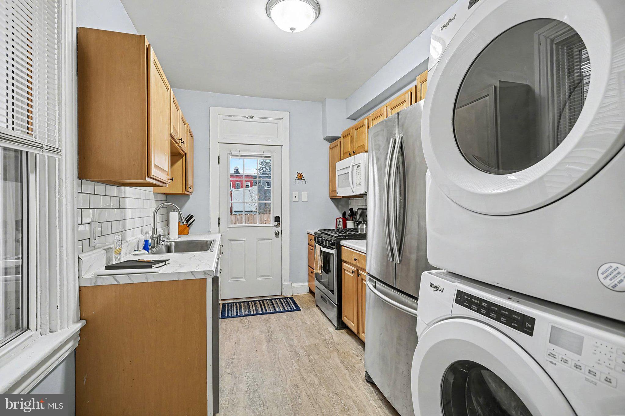 353 East Marion Street Lancaster, PA 17602 - Photo 15 of 28 a view of a kitchen with washer and dryer