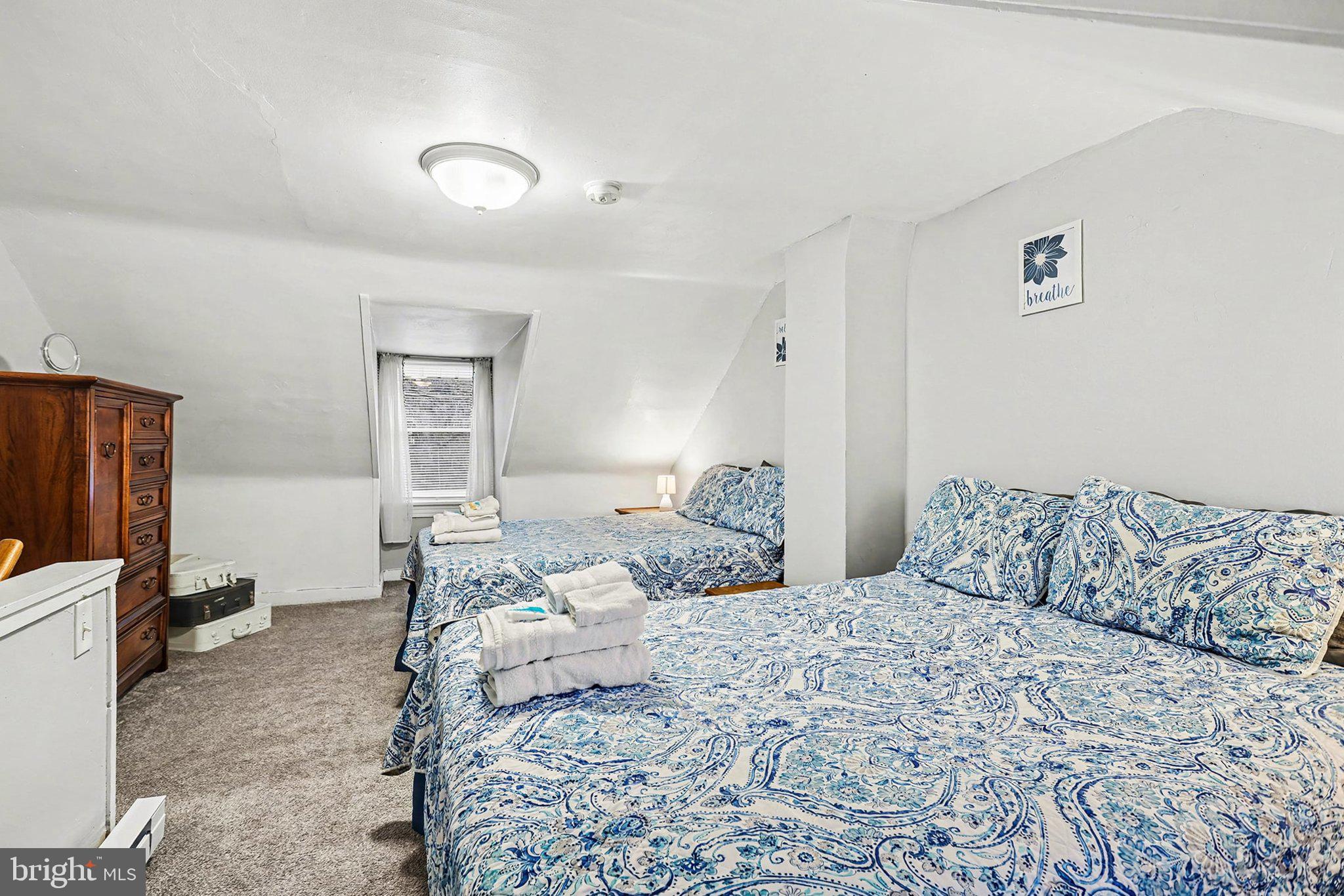 353 East Marion Street Lancaster, PA 17602 - Photo 22 of 28 a bedroom with a large bed and a window