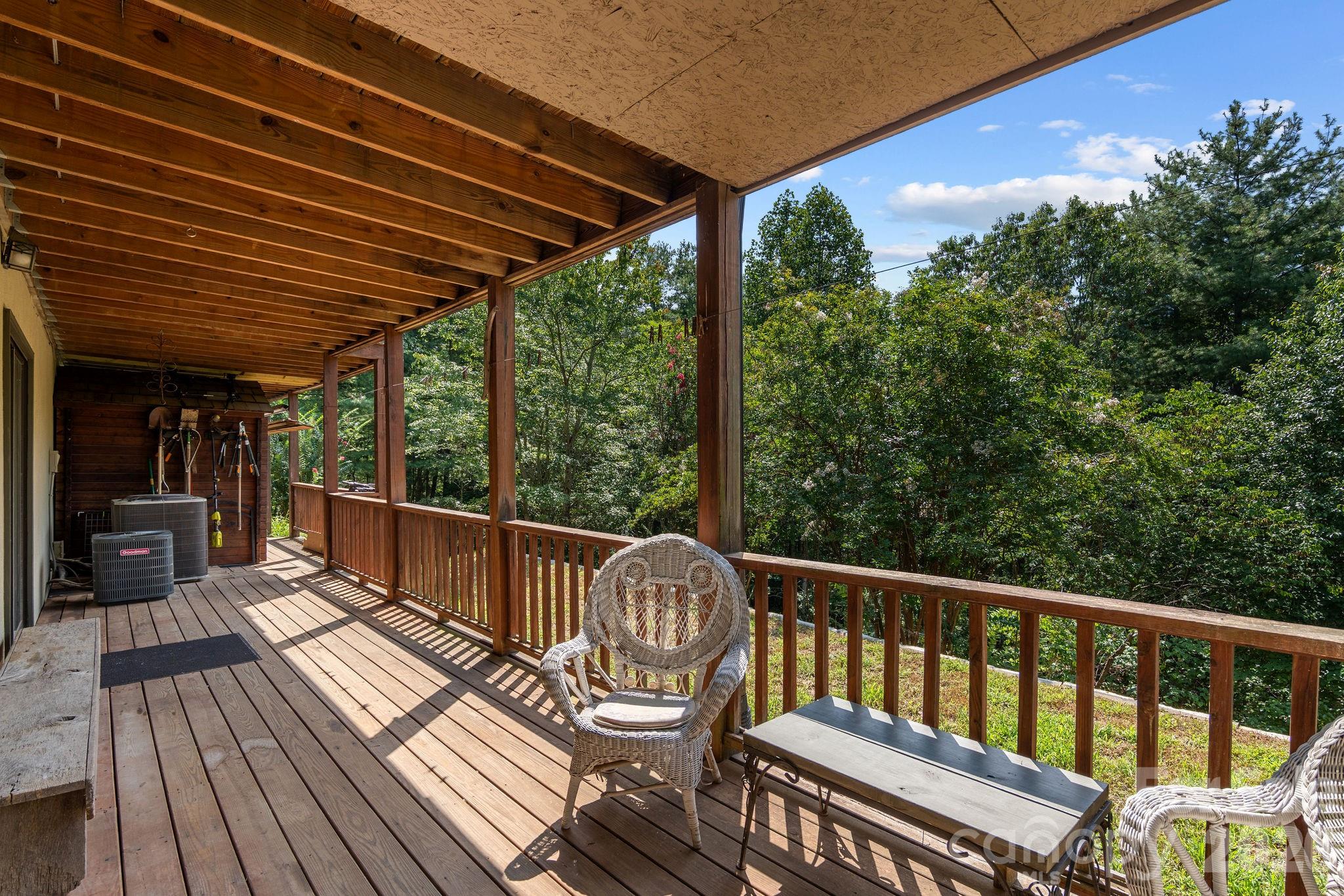 150 Avondale Ridge Road Asheville, NC 28803 - Photo 35 of 45 a view of a two chairs and table on the wooden floor