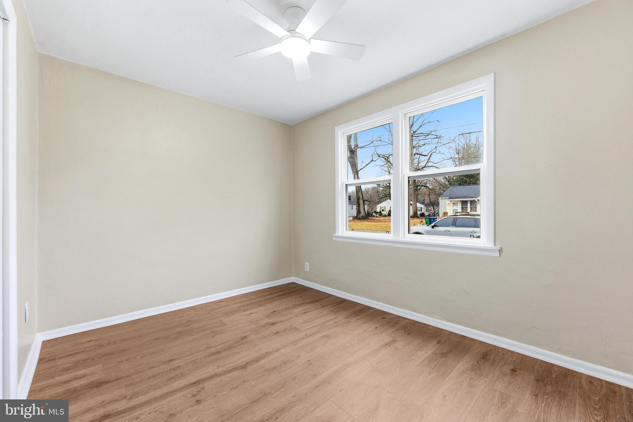 3 Victory Street Aberdeen, MD 21001 - Photo 15 of 26 wooden floor in an empty room with a window