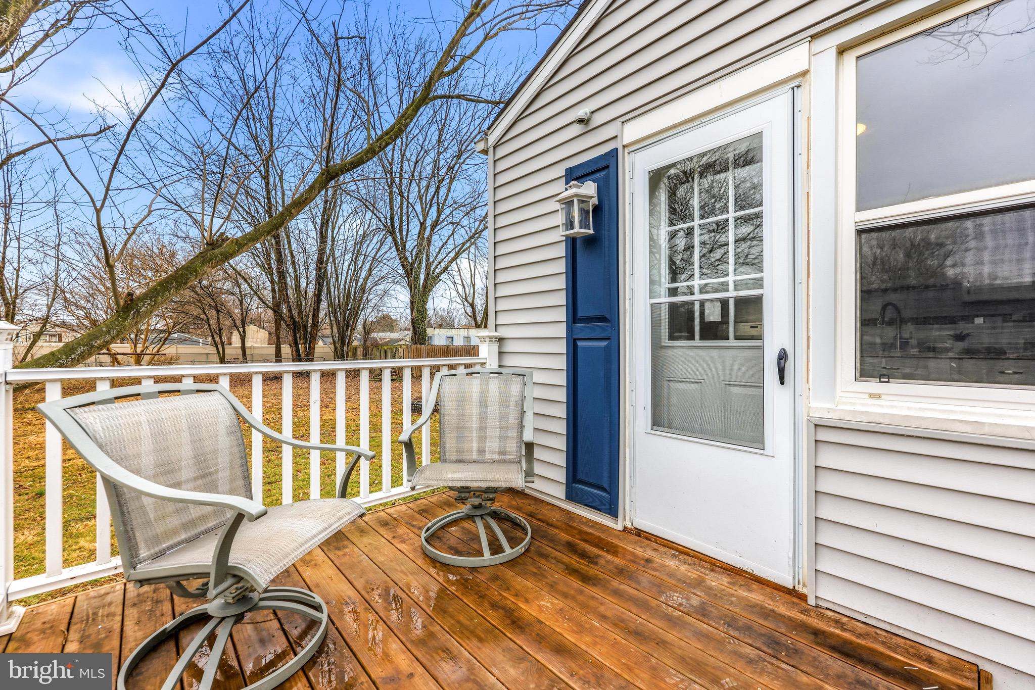 3 Victory Street Aberdeen, MD 21001 - Photo 19 of 26 a view of a balcony with wooden floor and fence
