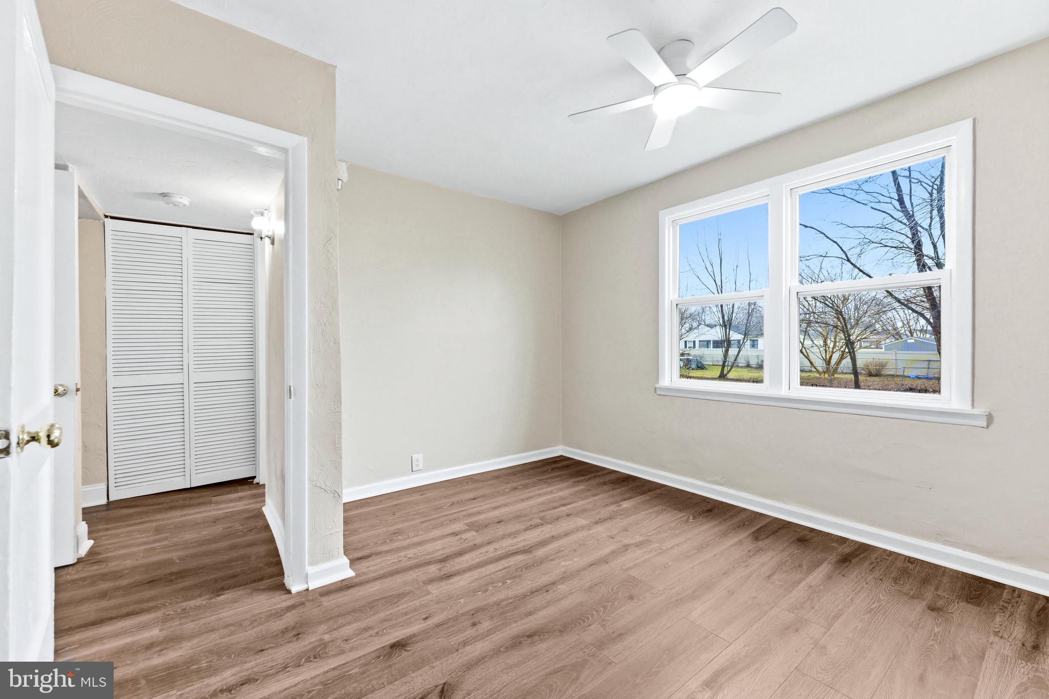 3 Victory Street Aberdeen, MD 21001 - Photo 7 of 26 wooden floor in an empty room with a window