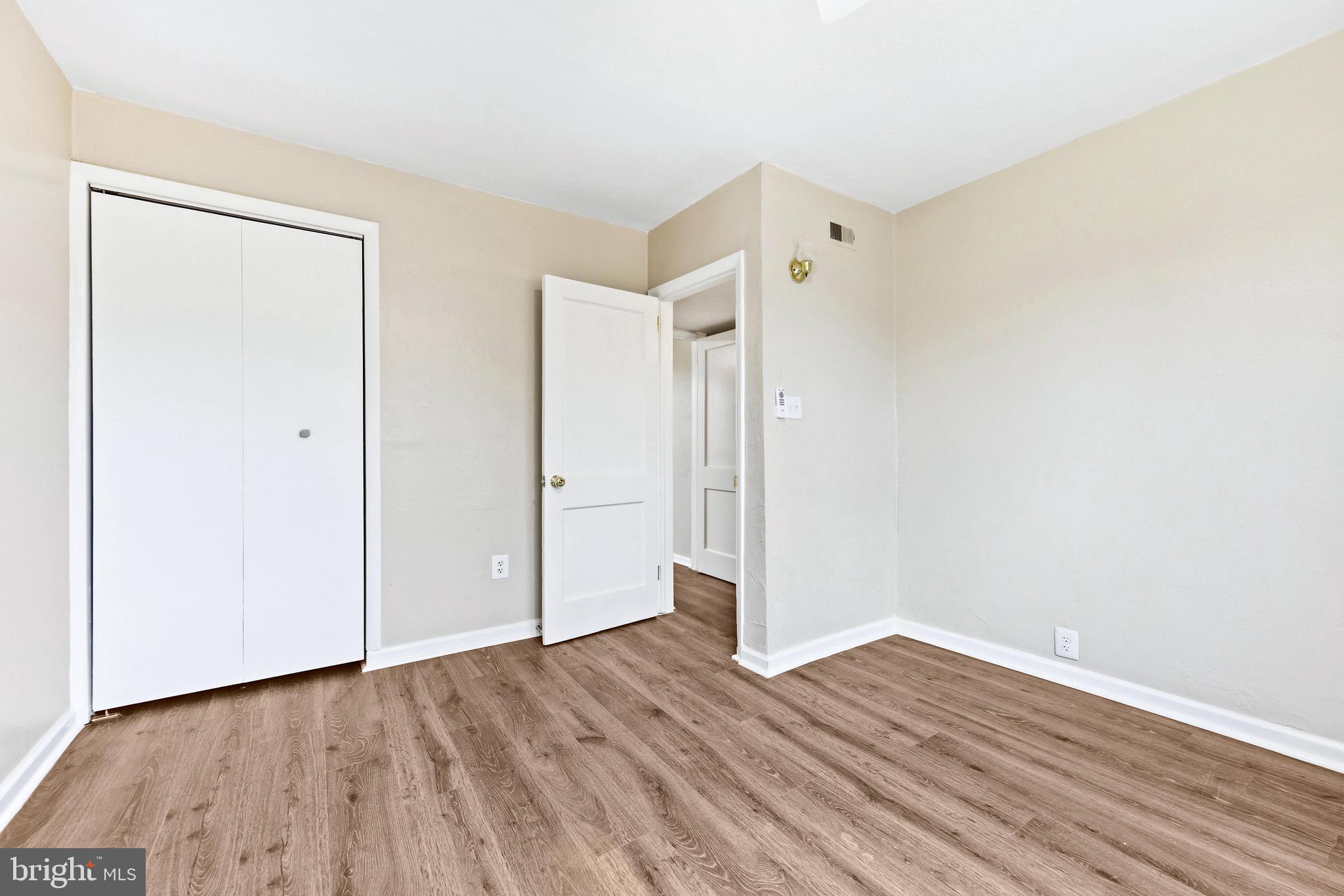 3 Victory Street Aberdeen, MD 21001 - Photo 8 of 26 a view of an empty room with wooden floor