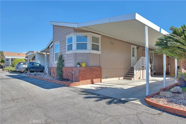 a backyard of the house with outdoor seating