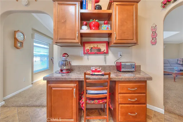 a patio with table and chairs