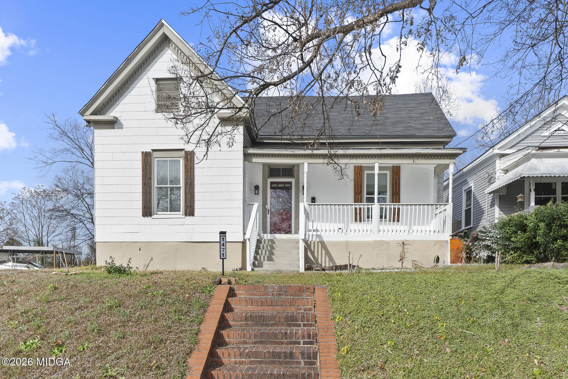 front view of a house with a yard