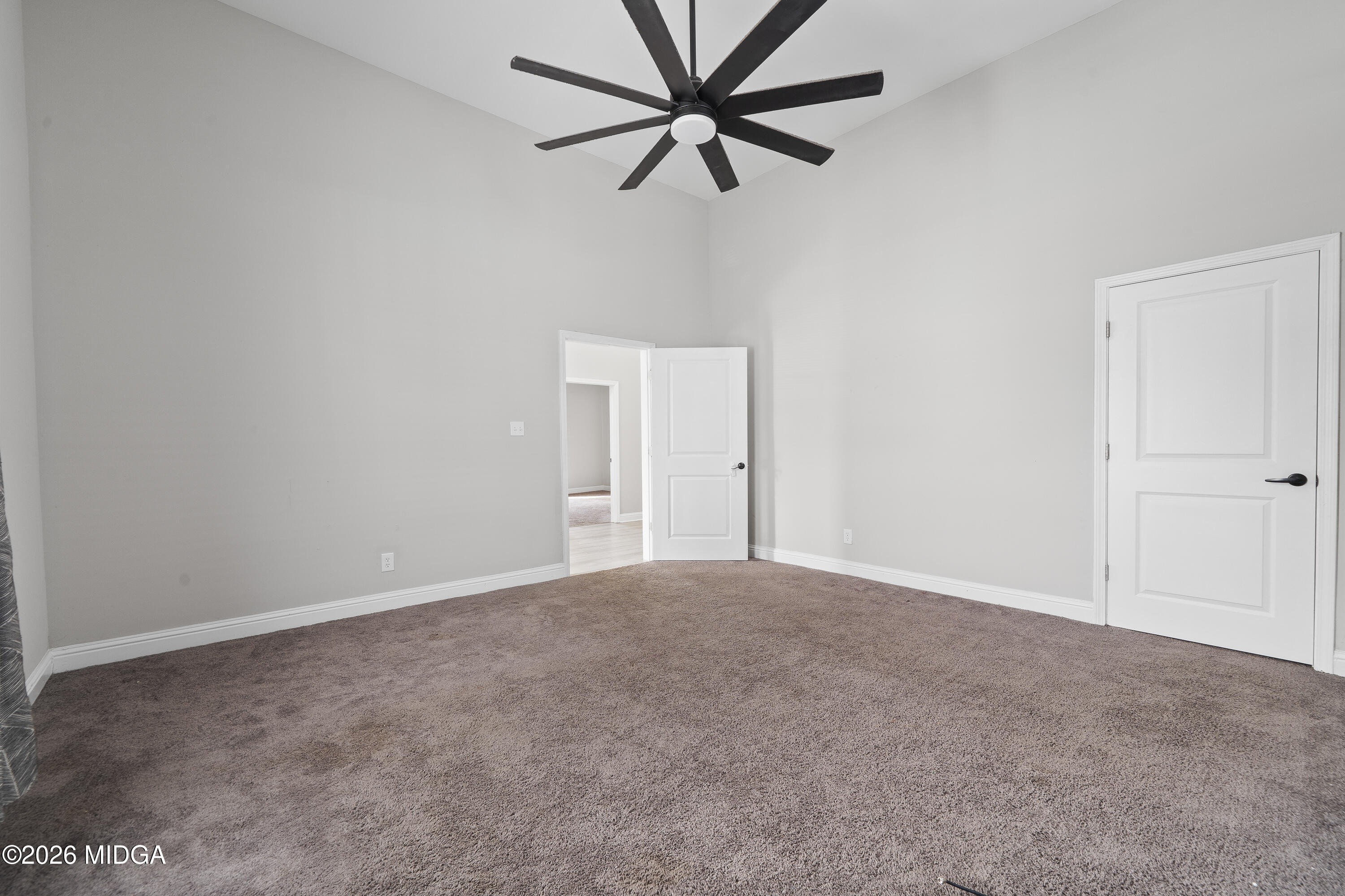 1471 Jackson Street Macon, GA 31201 - Photo 16 of 31 a view of a big room with a chandelier fan