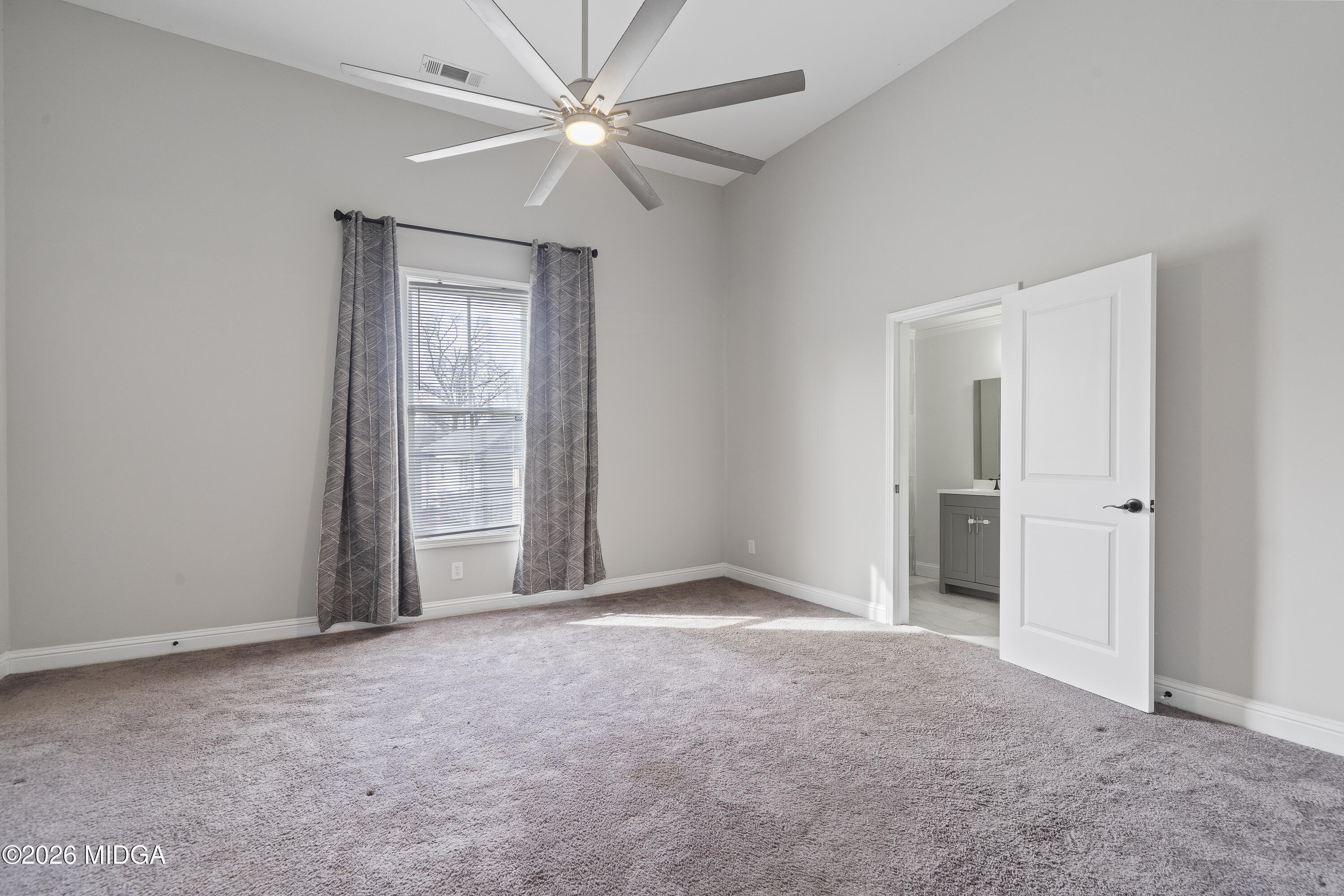 1471 Jackson Street Macon, GA 31201 - Photo 17 of 31 a view of an empty room with a window