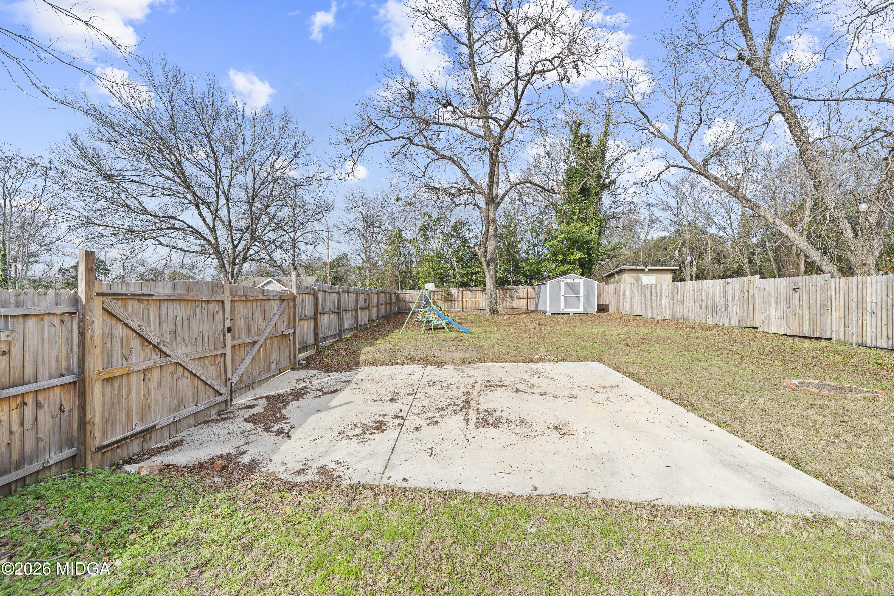 1471 Jackson Street Macon, GA 31201 - Photo 28 of 31 a view of a yard with wooden fence