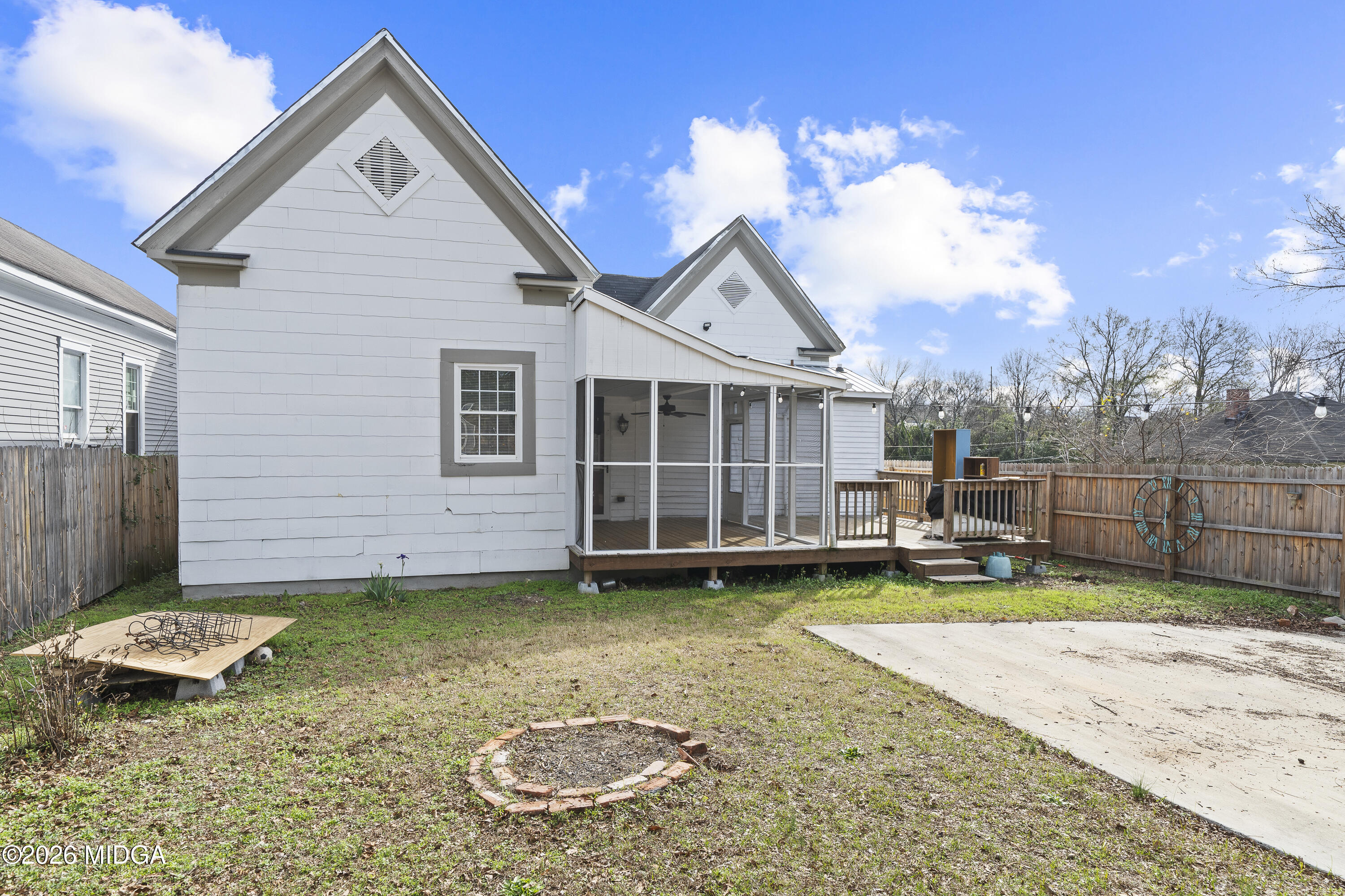 1471 Jackson Street Macon, GA 31201 - Photo 31 of 31 a view of a house with backyard and sitting area