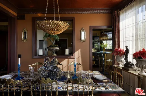 a room with lots of potted plants