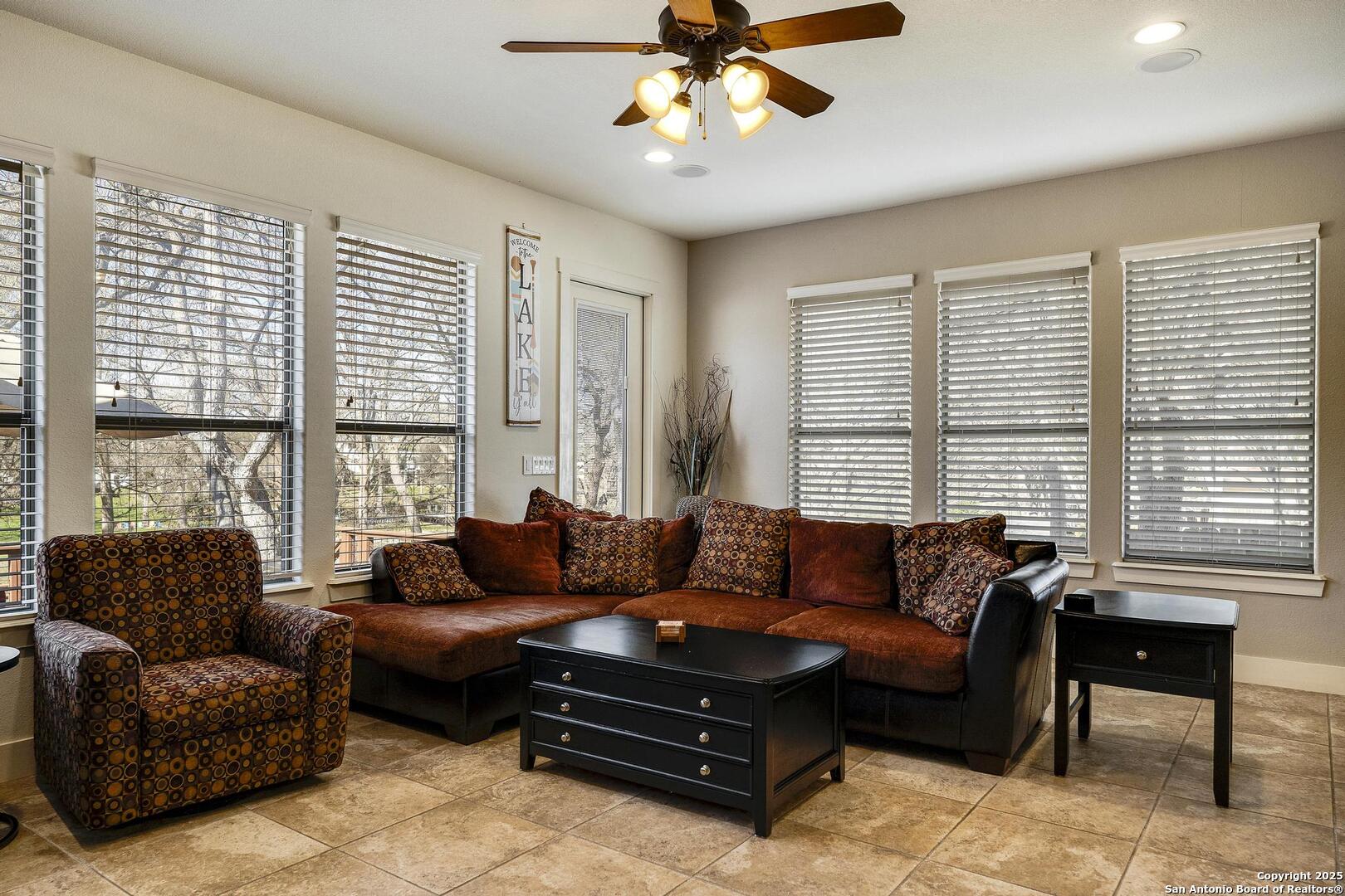 630 3 Oaks Road Seguin, TX 78155 - Photo 12 of 31 a living room with furniture and a large window