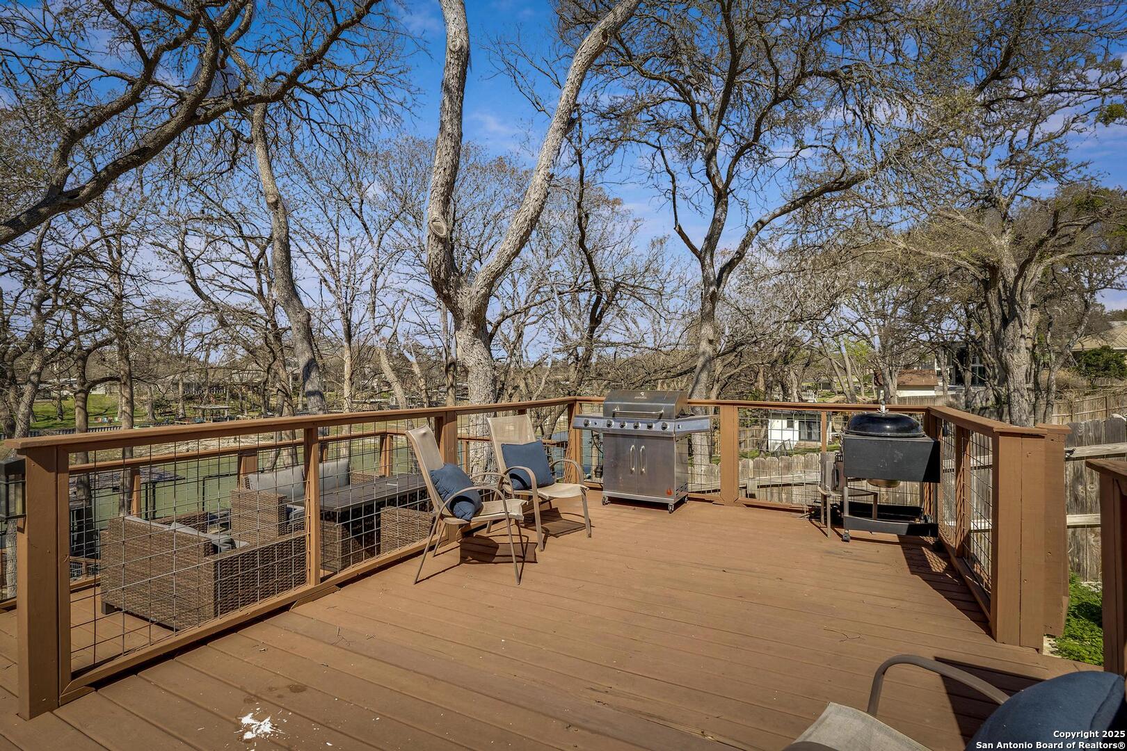 630 3 Oaks Road Seguin, TX 78155 - Photo 25 of 31 a view of a yard with trees