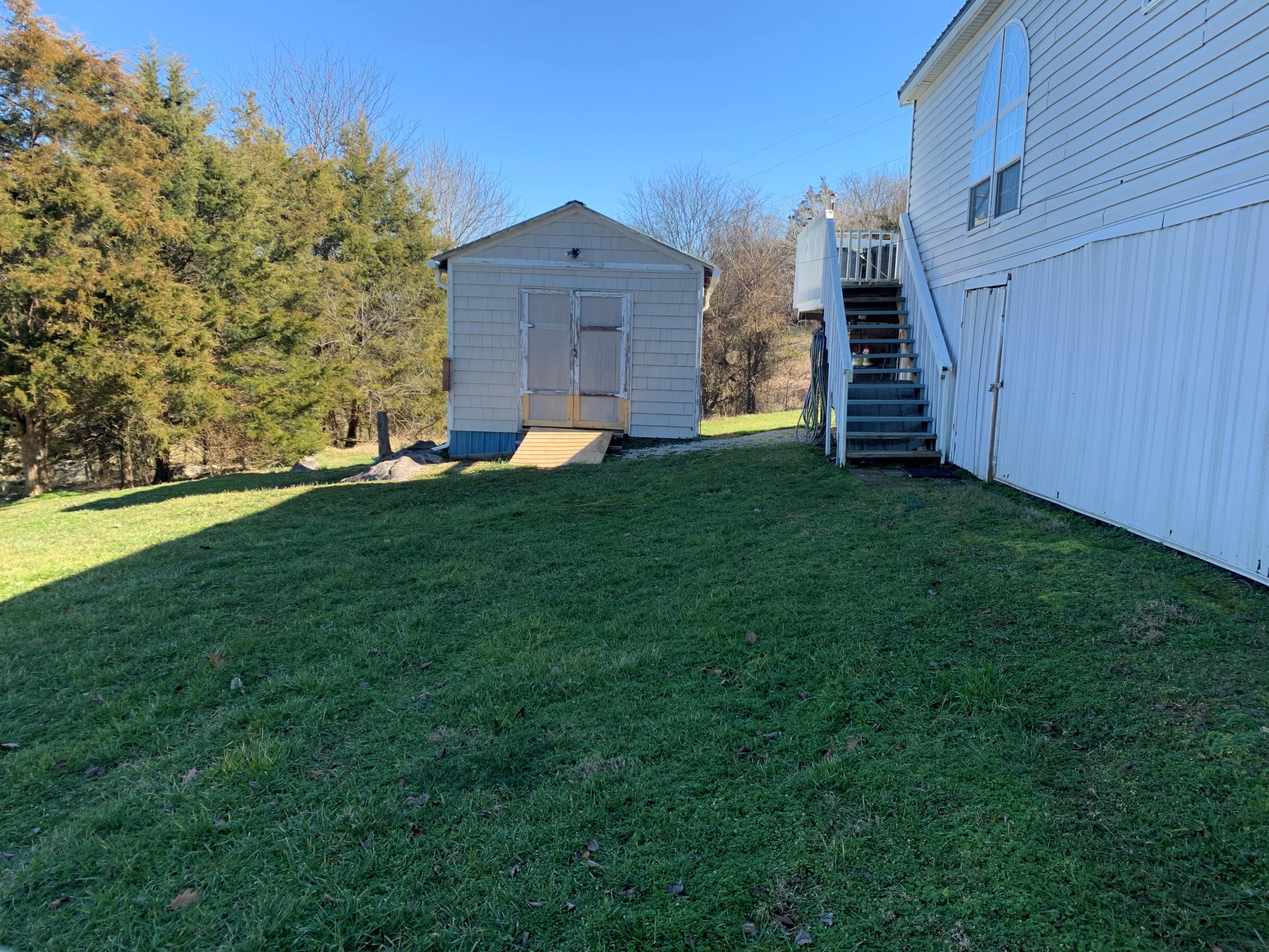 1155 Harbin Road Dandridge, TN 37725 - Photo 4 of 27 Back to shed