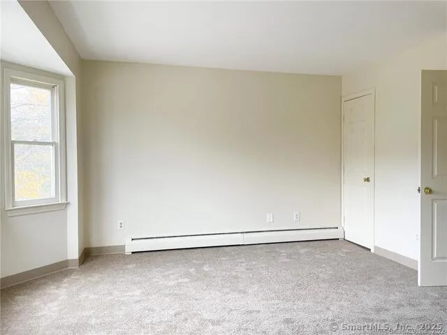 a view of a room with an empty space