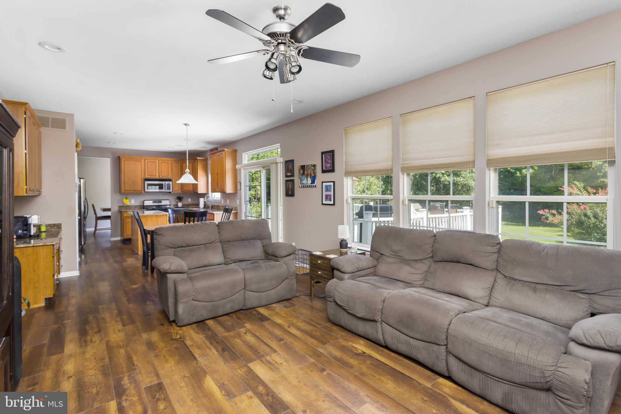 59 Birmingham Drive Columbus, NJ 08022 - Photo 19 of 45 a living room with furniture and a large window