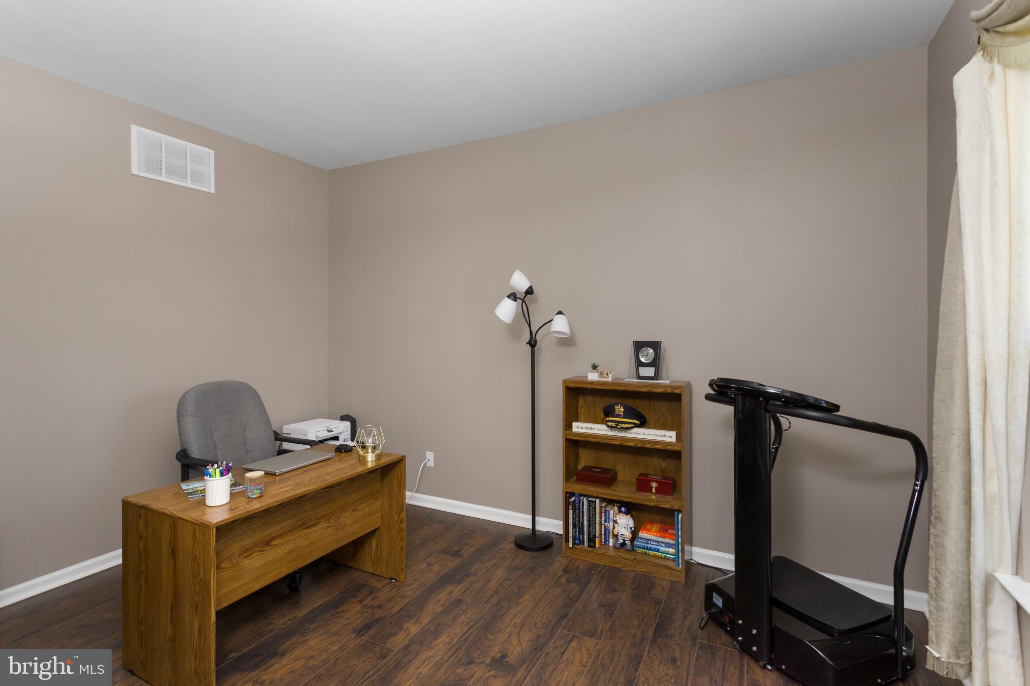 59 Birmingham Drive Columbus, NJ 08022 - Photo 20 of 45 a view of a workspace with furniture and wooden floor