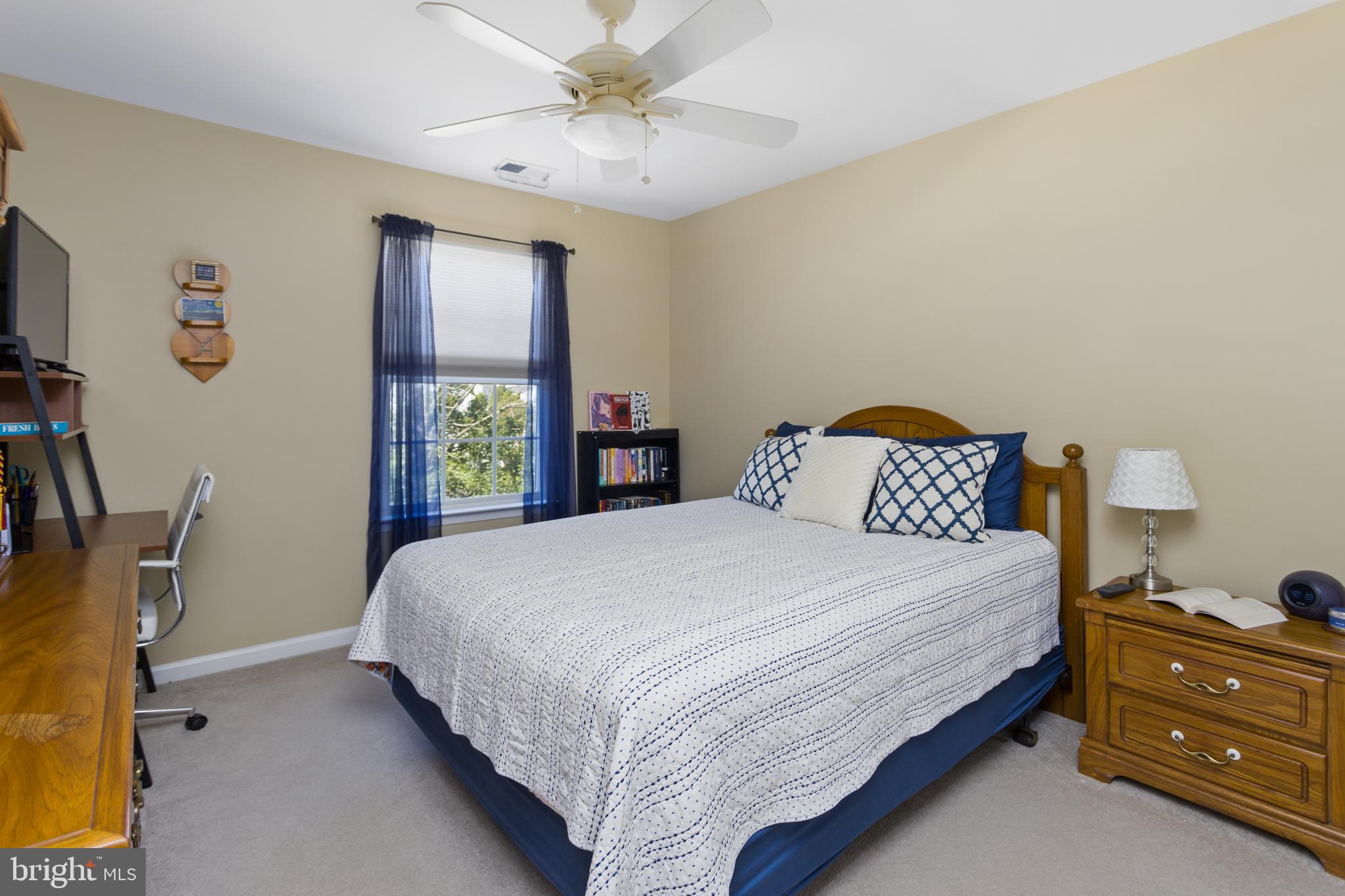 59 Birmingham Drive Columbus, NJ 08022 - Photo 32 of 45 a bedroom with a bed dresser and a window