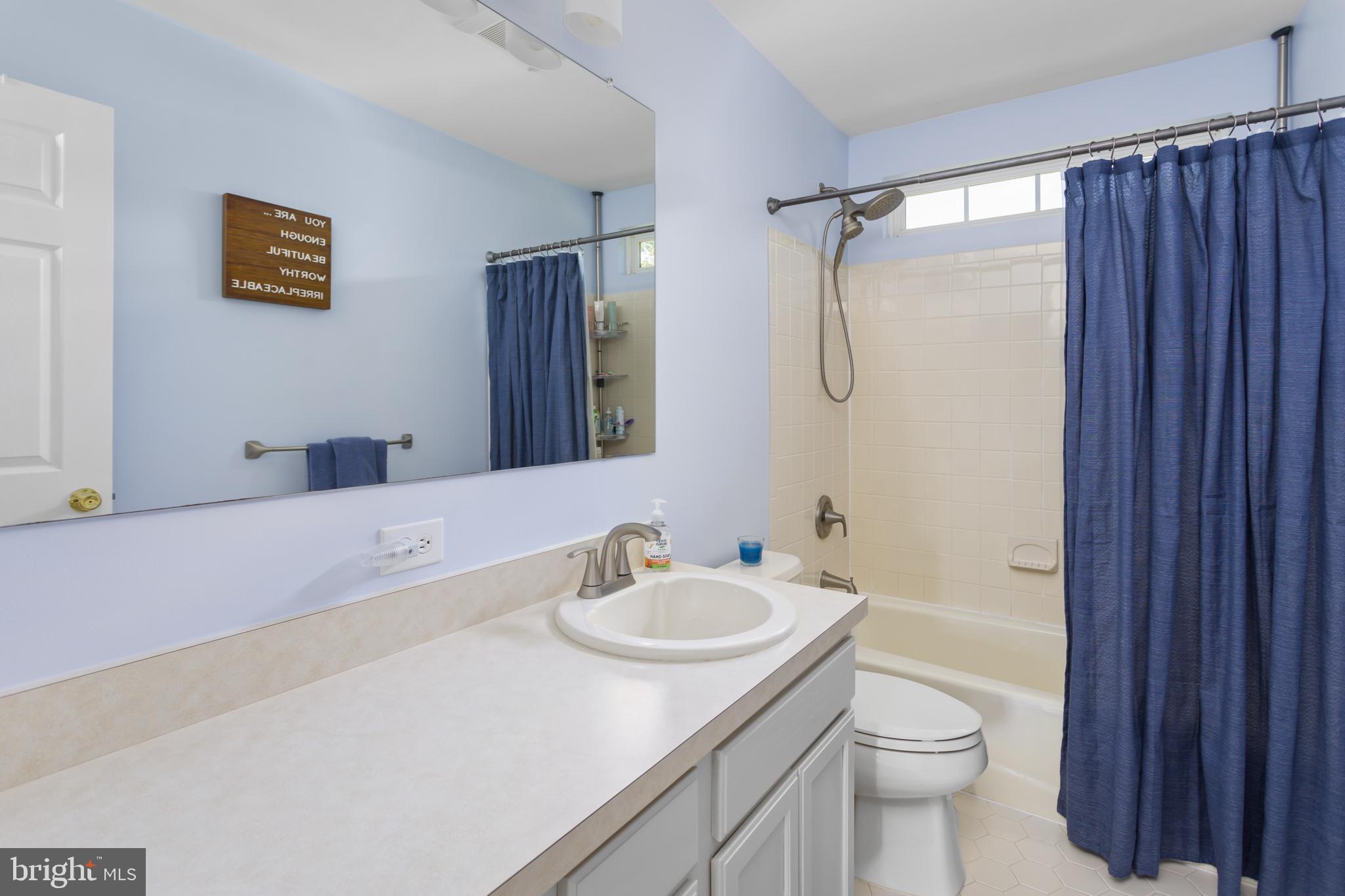 59 Birmingham Drive Columbus, NJ 08022 - Photo 33 of 45 a bathroom with a granite countertop sink a toilet and shower