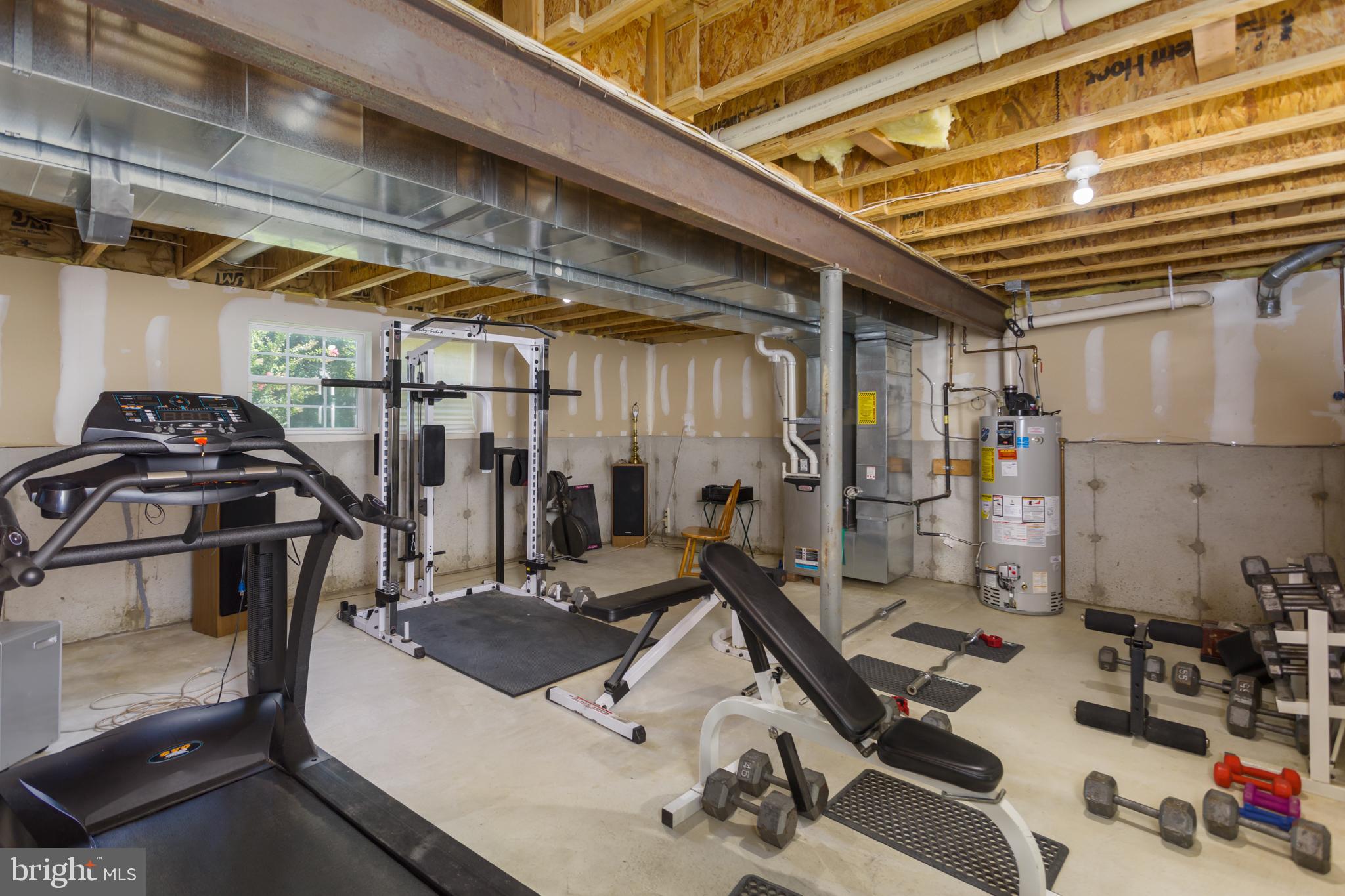 59 Birmingham Drive Columbus, NJ 08022 - Photo 36 of 45 a view of a room with gym equipment