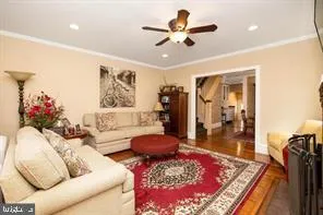 a living room with furniture and a rug