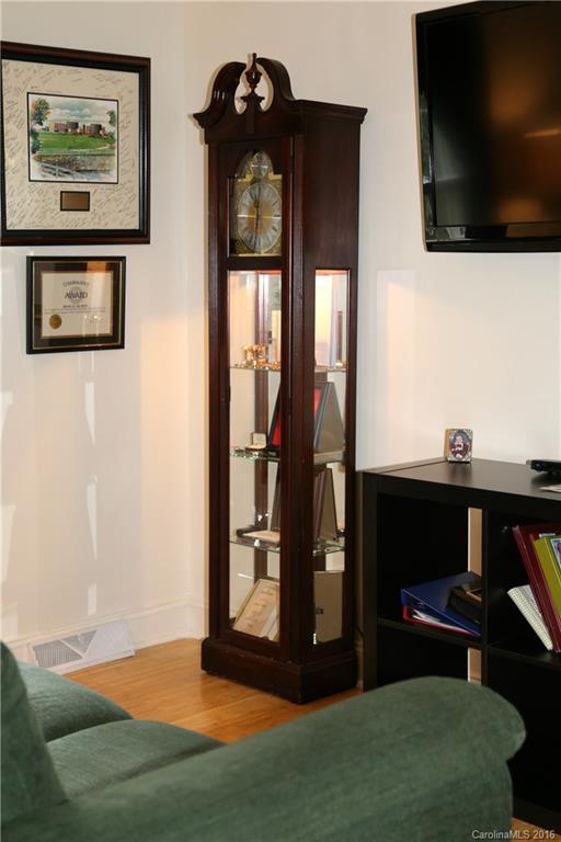 113 Sawtooth Lane, Unit 27 Stanley, NC 28164 - Photo 19 of 24 a view of workspace with furniture and flat screen tv