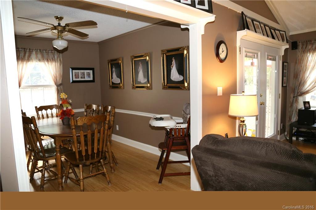 113 Sawtooth Lane, Unit 27 Stanley, NC 28164 - Photo 9 of 24 a view of a livingroom and dining room