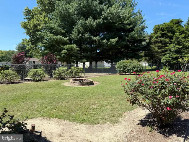 a backyard of a house with seating space