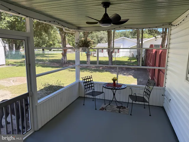 a view of a yard from a balcony