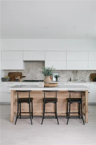 a view with a table and chairs in it