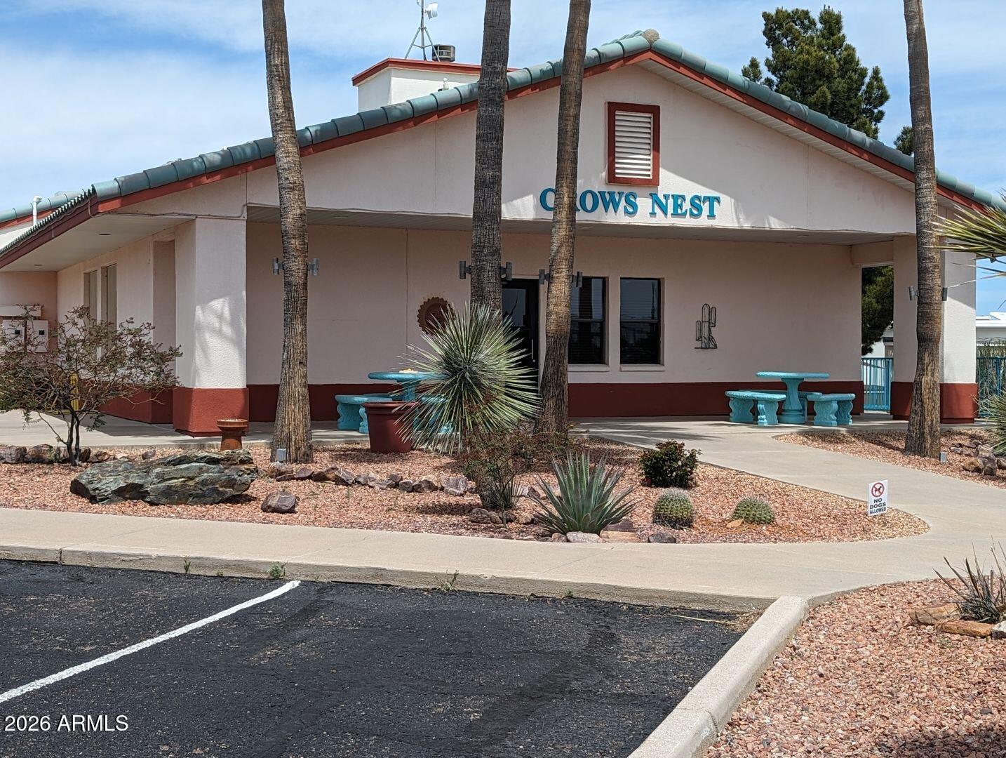 1030 Barrel Cactus Ridge, Unit 225 Benson, AZ 85602 - Photo 12 of 15 a front view of a house with garden