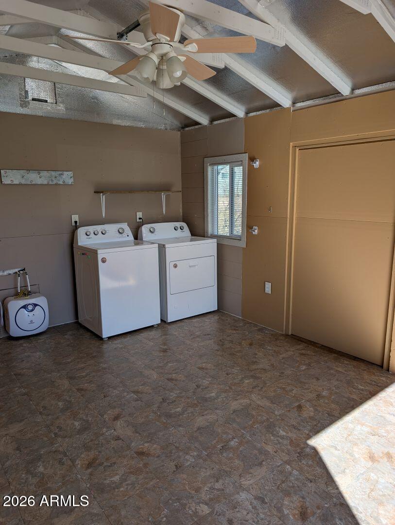 1030 Barrel Cactus Ridge, Unit 225 Benson, AZ 85602 - Photo 4 of 15 a view of a livingroom with furniture and a ceiling fan