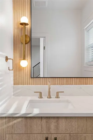 a bathroom with a bathtub and shower