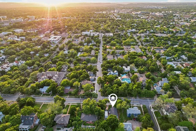 an aerial view of residential house with parking space