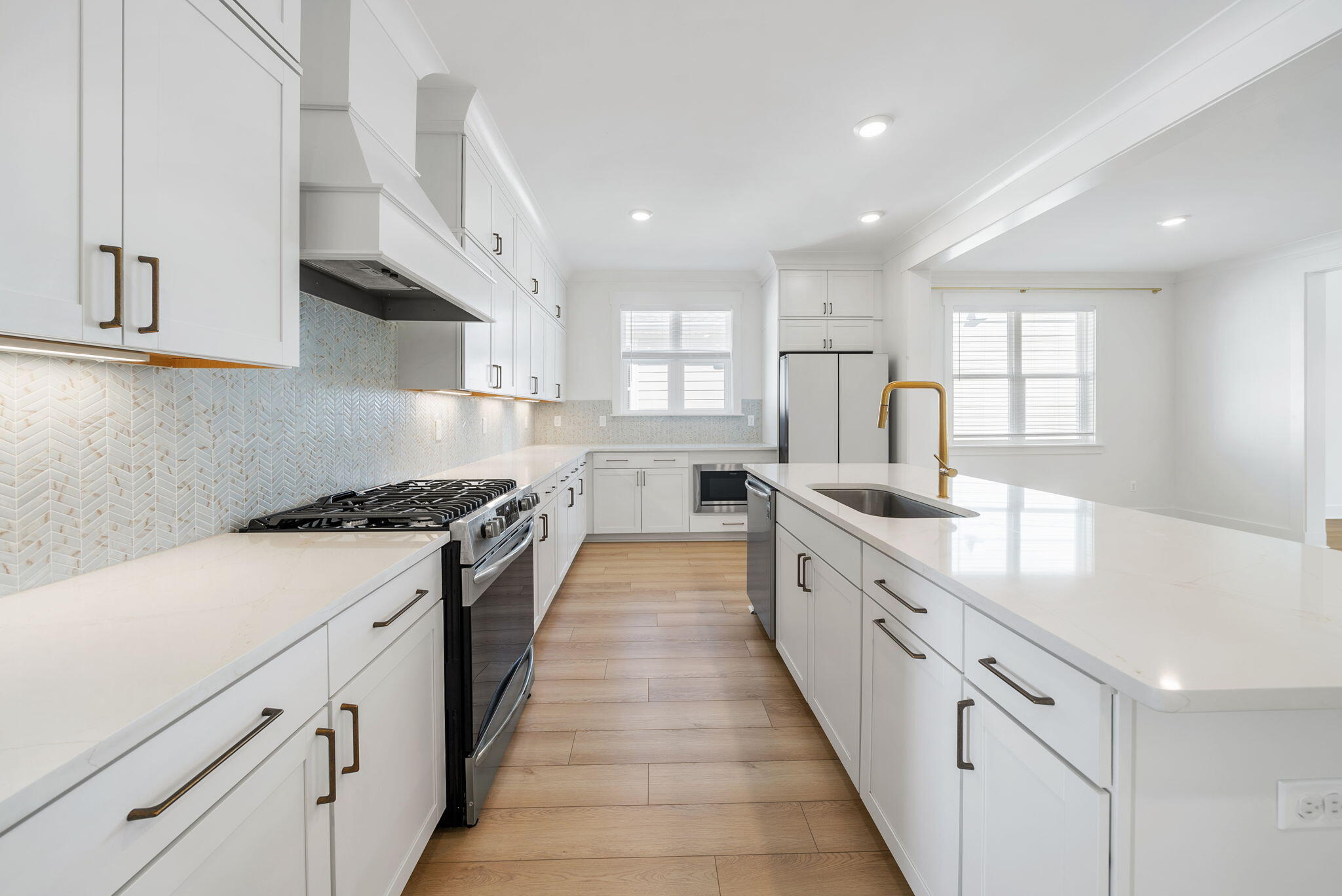 1917 Rushes Avenue Panama City, FL 32405 - Photo 14 of 66 a large kitchen with stainless steel appliances granite countertop a lot of counter space