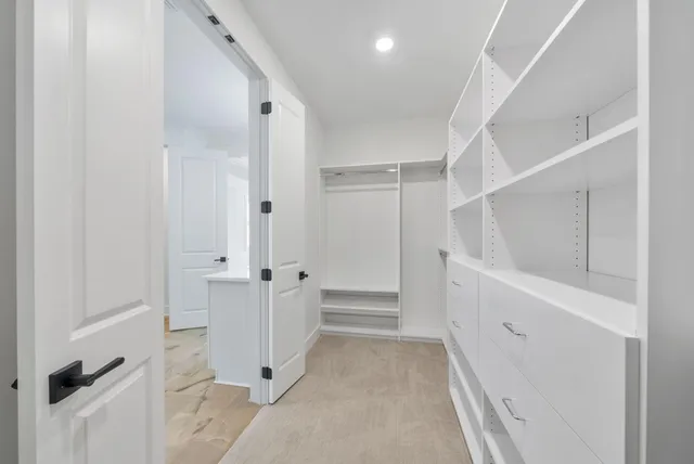 a view of a room with racks on the wall