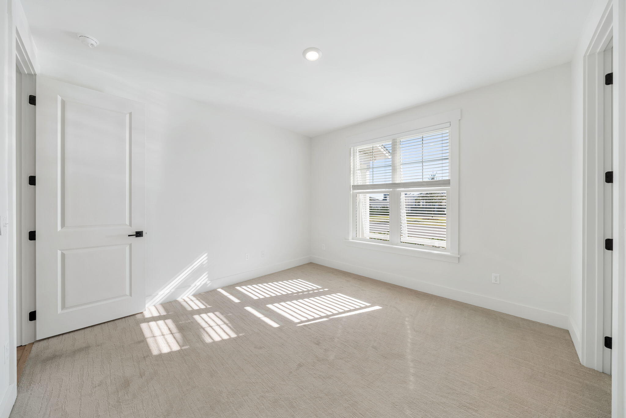 1917 Rushes Avenue Panama City, FL 32405 - Photo 27 of 66 a view of an empty room and a window