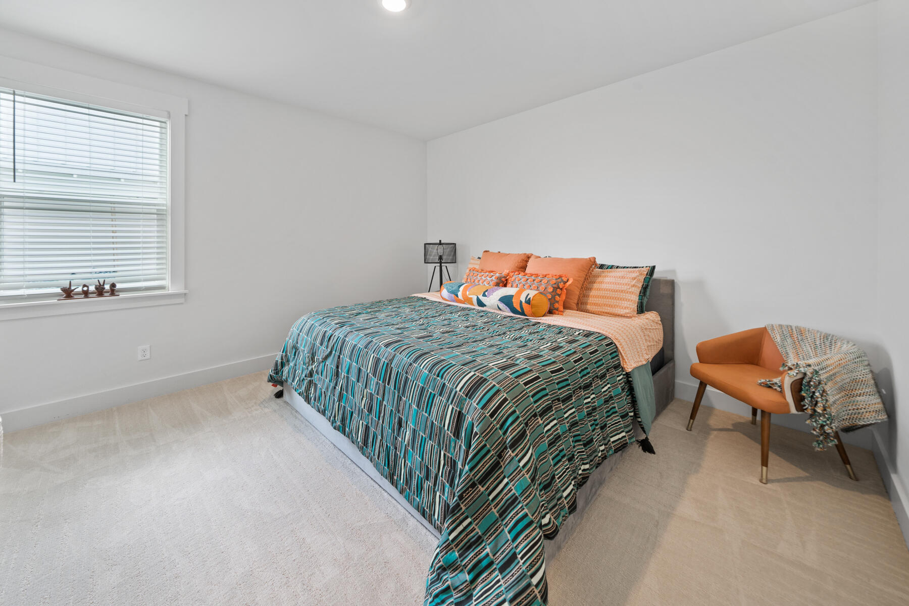 1917 Rushes Avenue Panama City, FL 32405 - Photo 30 of 66 a bedroom with a bed and a chair