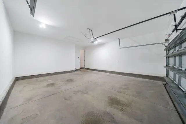 an aerial view of a houses with outdoor space