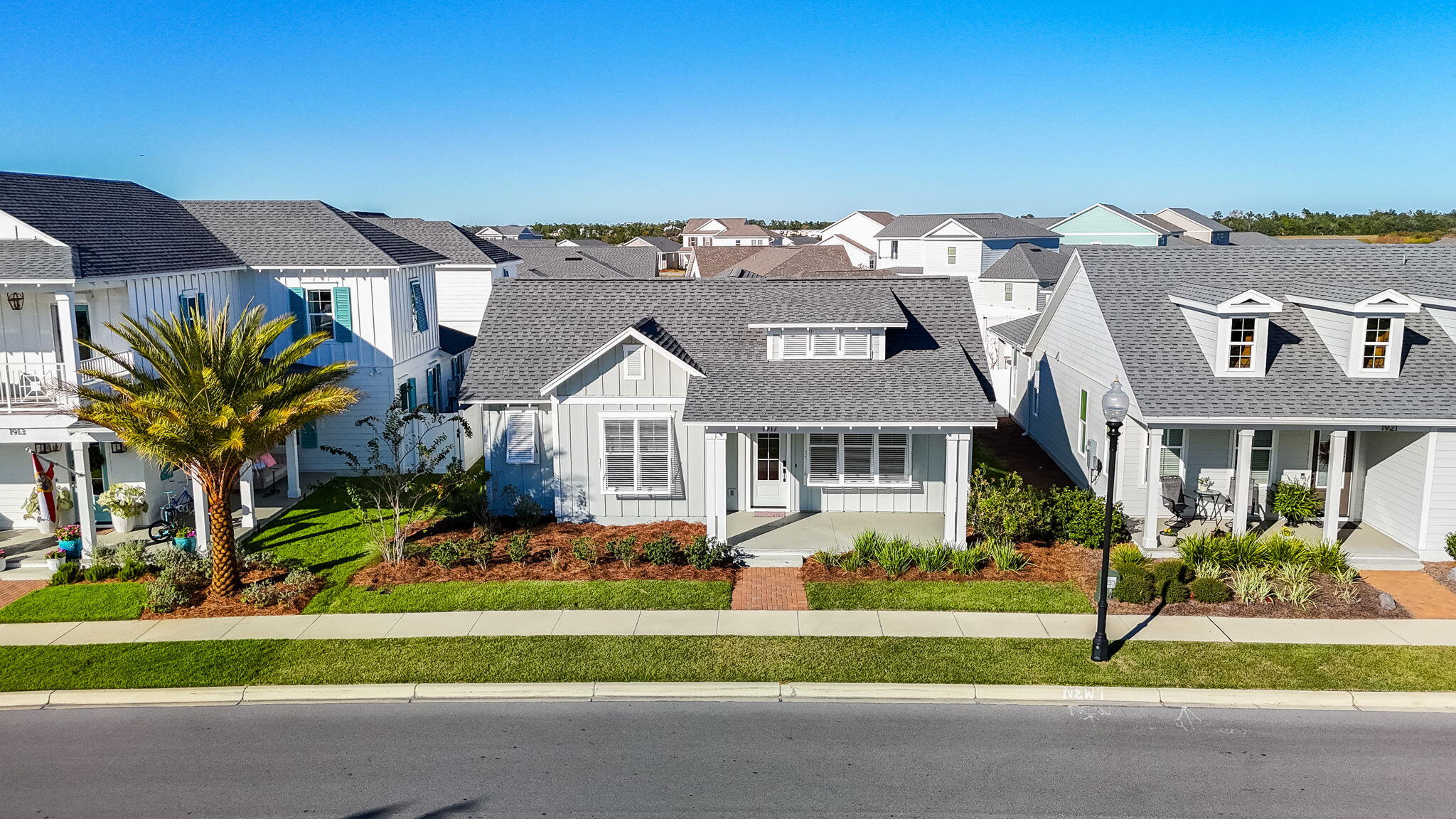 1917 Rushes Avenue Panama City, FL 32405 - Photo 49 of 66 a front view of a house with a yard
