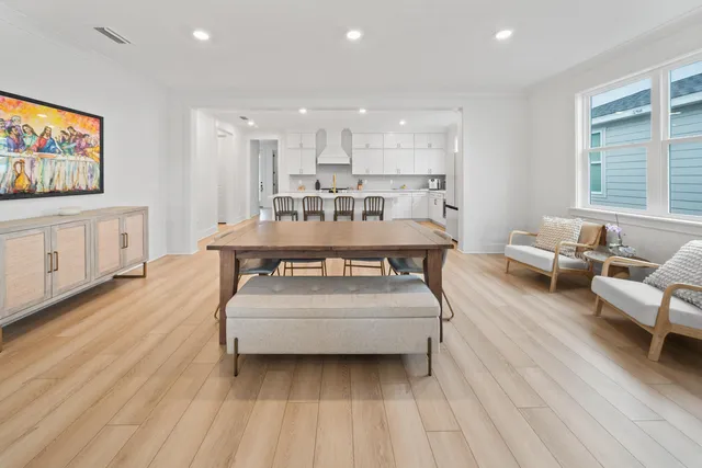 a kitchen with stainless steel appliances granite countertop a sink and stove top oven
